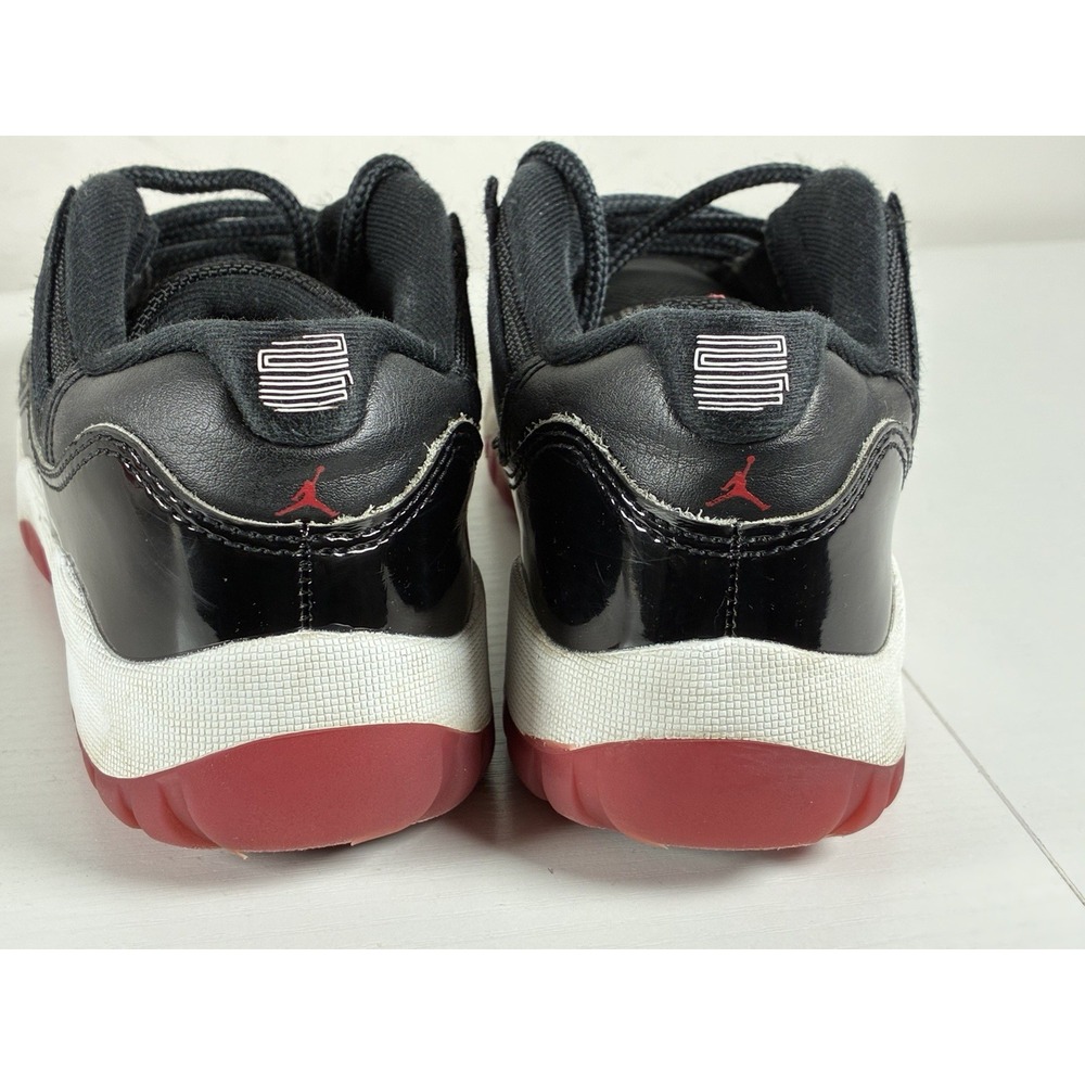 Air Jordan 11 Retro Low "Bred" 2Y Youth Basketball Shoes - Picture 4 of 9